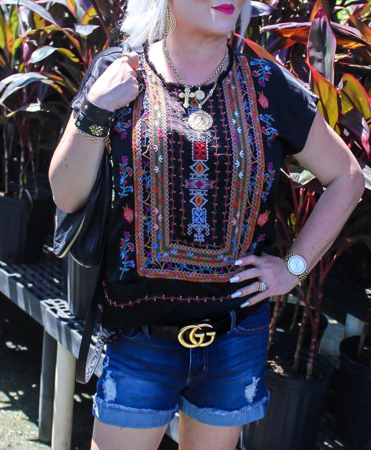 Michael Kors watch, Biya top, Gucci belt. leather cuffs, Luxor Living and Style